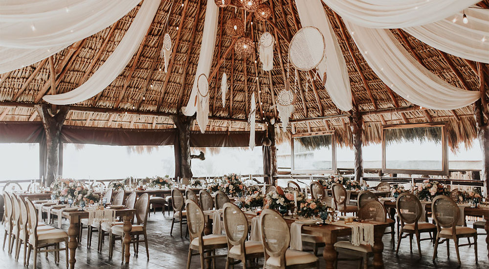 Akiin Beach Club wedding venue in Tulum, Mexico – beachfront venue with white sand, turquoise Caribbean waters, and a bohemian tropical setting for destination weddings and elopements.