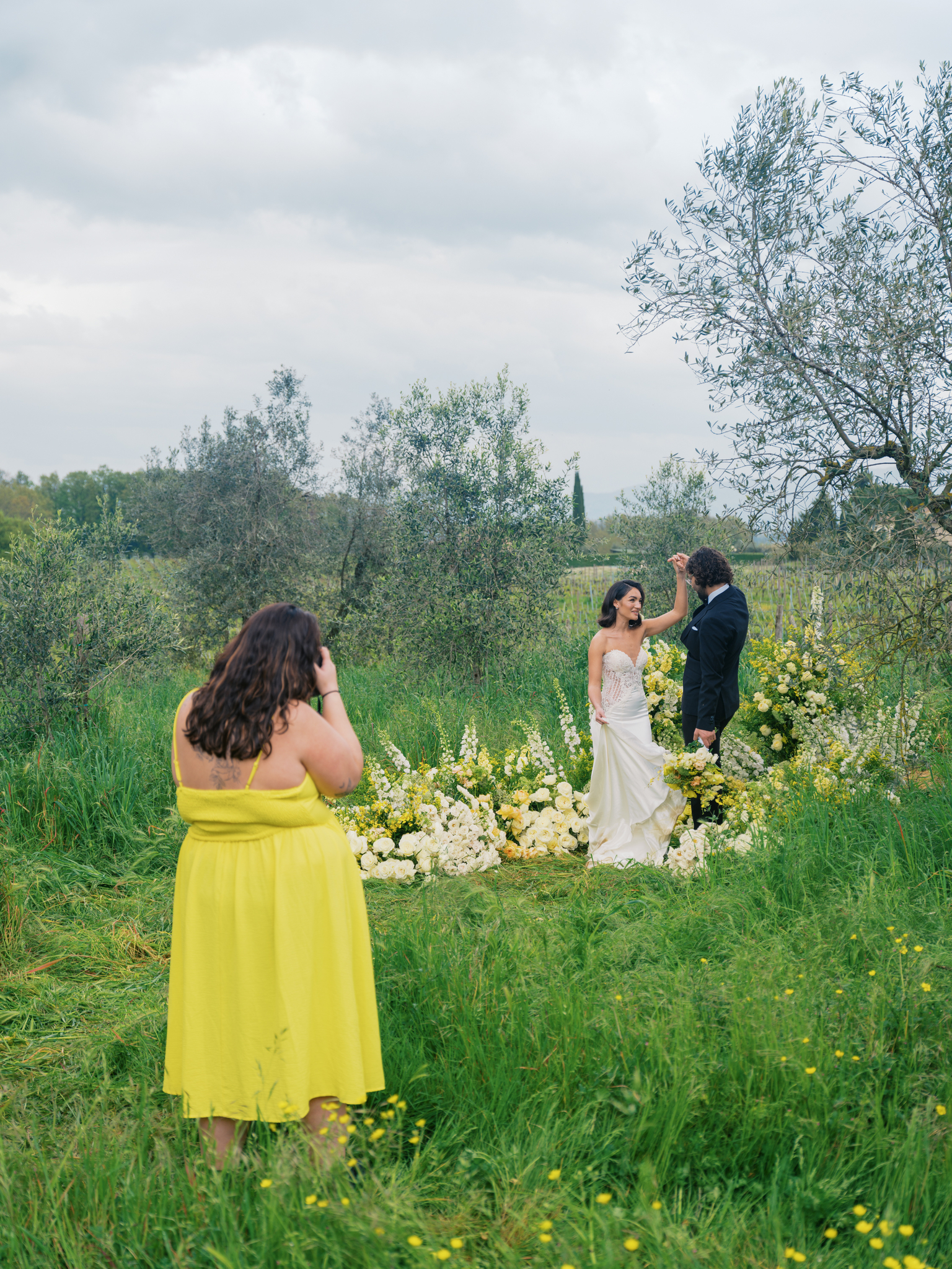 Photographer capturing details during a multi-day wedding planning weekend in Tuscany, Italy