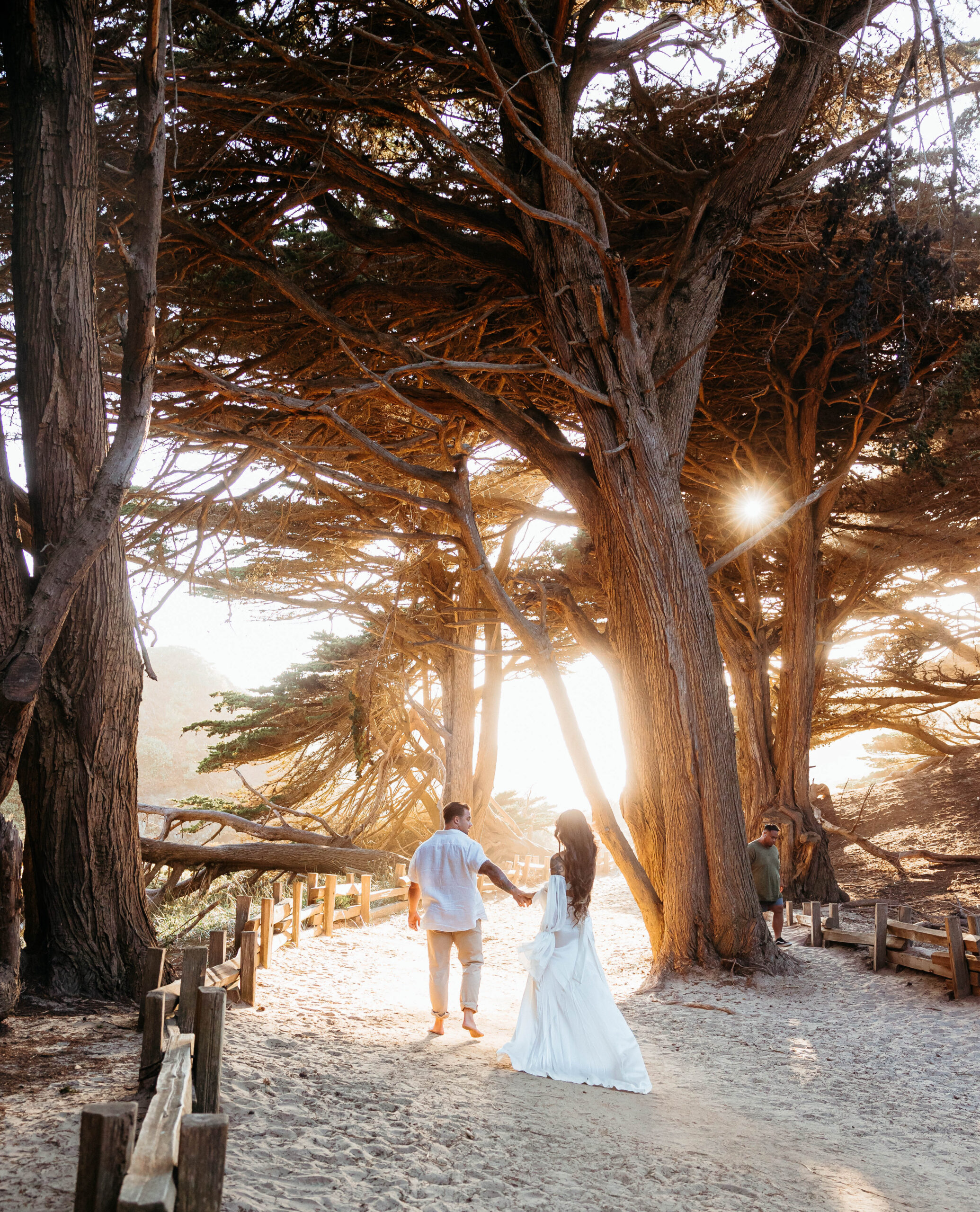 Walking towards the sunset at Pfeiffer beach in California