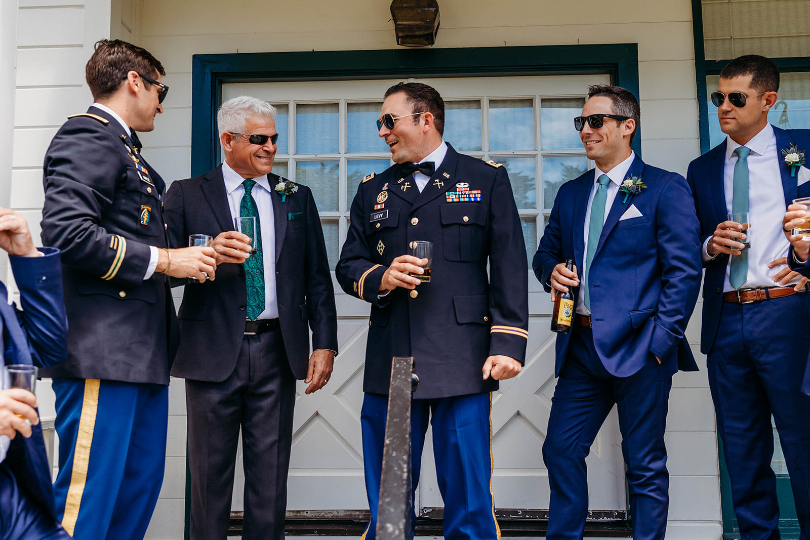 Groom and groomsmen hanging out before ceremony 