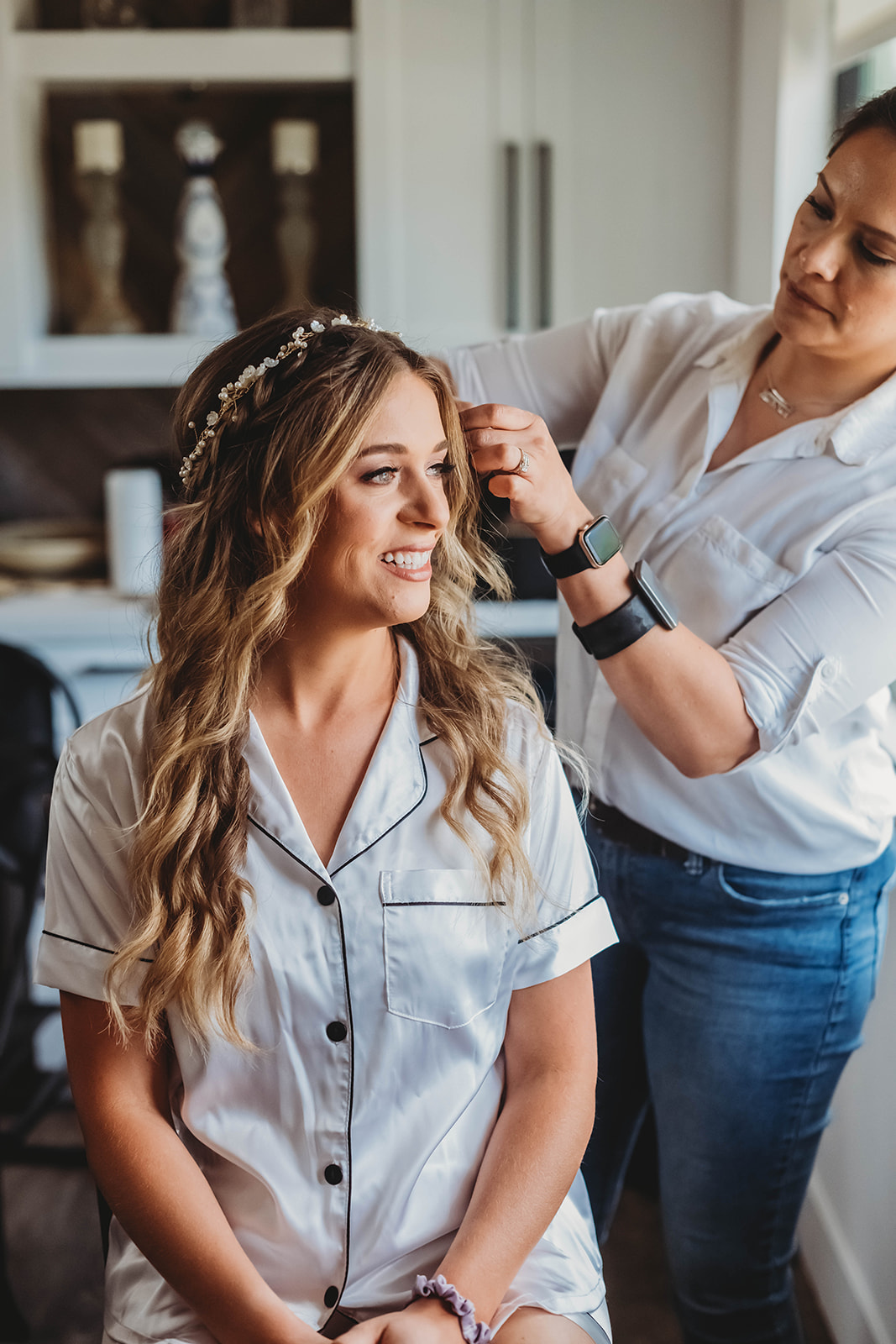 Bride getting hair done by Timeless Artistry in California